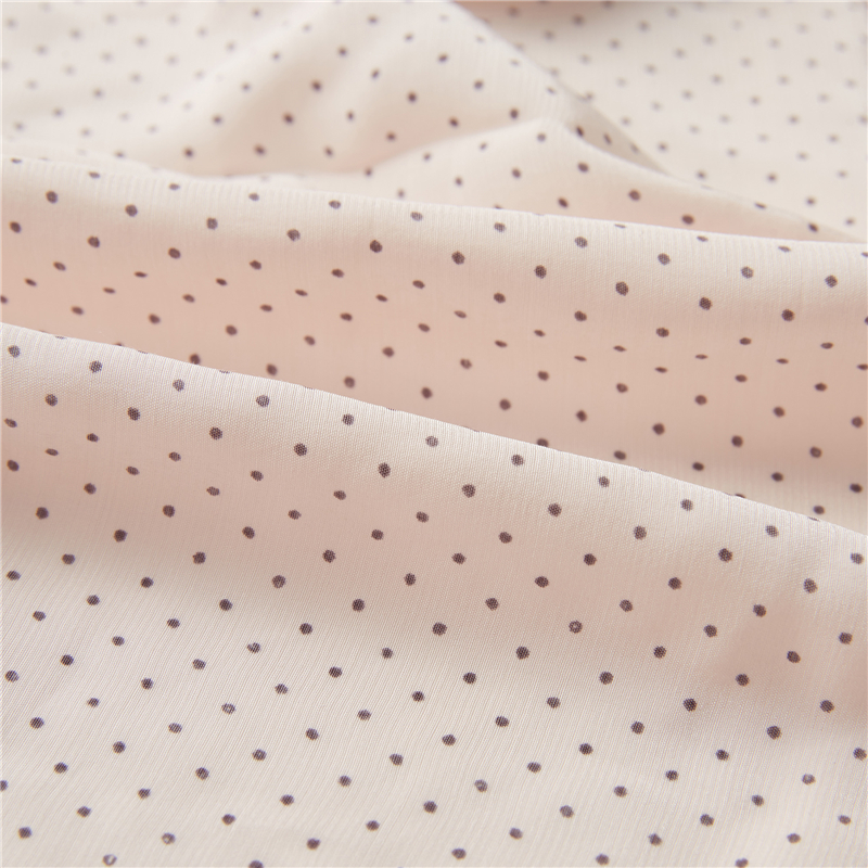 Pois noirs fond rose 51% rayonne 49% viscose popeline formes soyeuses tissu imprimé pois